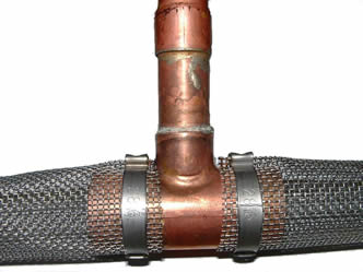 A connection detail of bazooka screen onto copper connector.