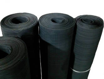 Four rolls of black woven wire cloths on the white background.