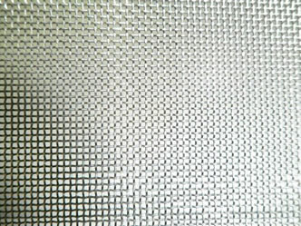 A piece of plain weave nickel woven wire mesh on the gray background.
