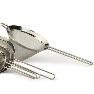 Four different sizes of conical strainers on the white background.
